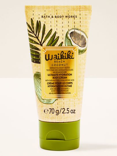 Mini tělový krém Waikiki Beach Coconut ve světlé tubě s tropickým motivem kokosu a zeleným víčkem.