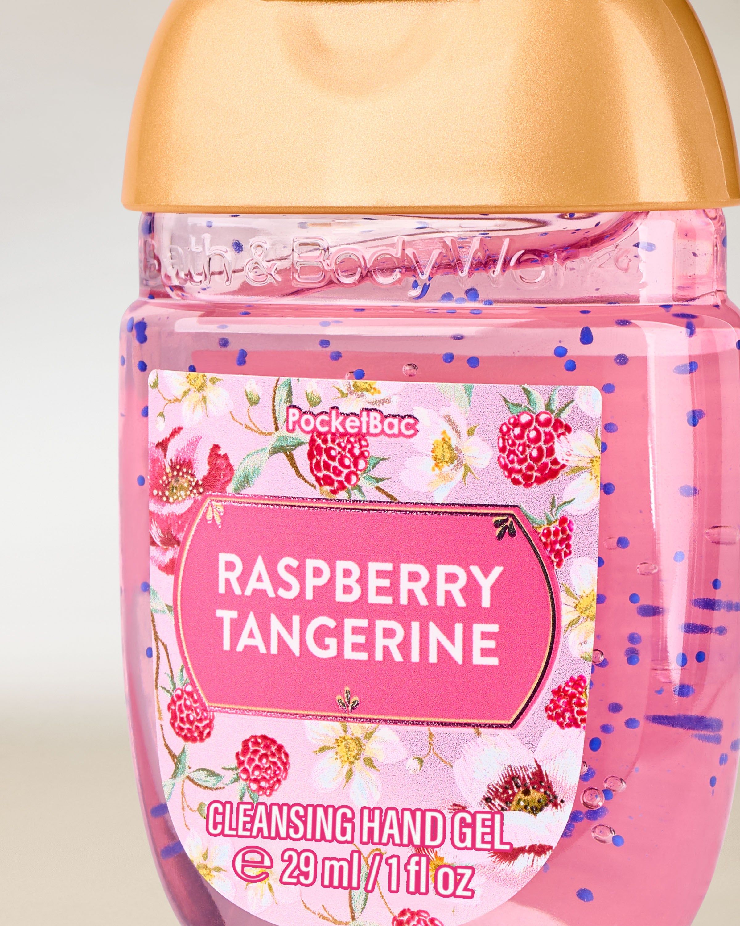 Čisticí gel na ruce Raspberry Tangerine v kompaktním balení, vhodný pro rychlé osvěžení během dne.