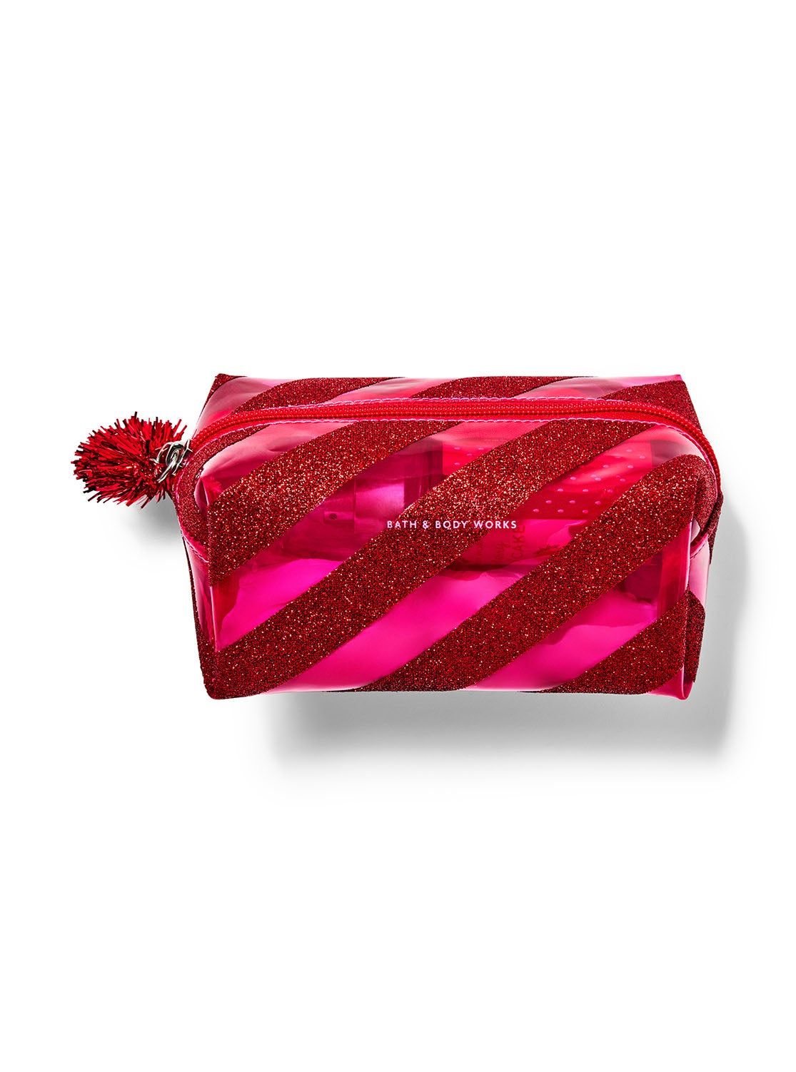 Kosmetyczka z czerwonego brokatu z różowymi paskami i pomponem, Bath & Body Works.