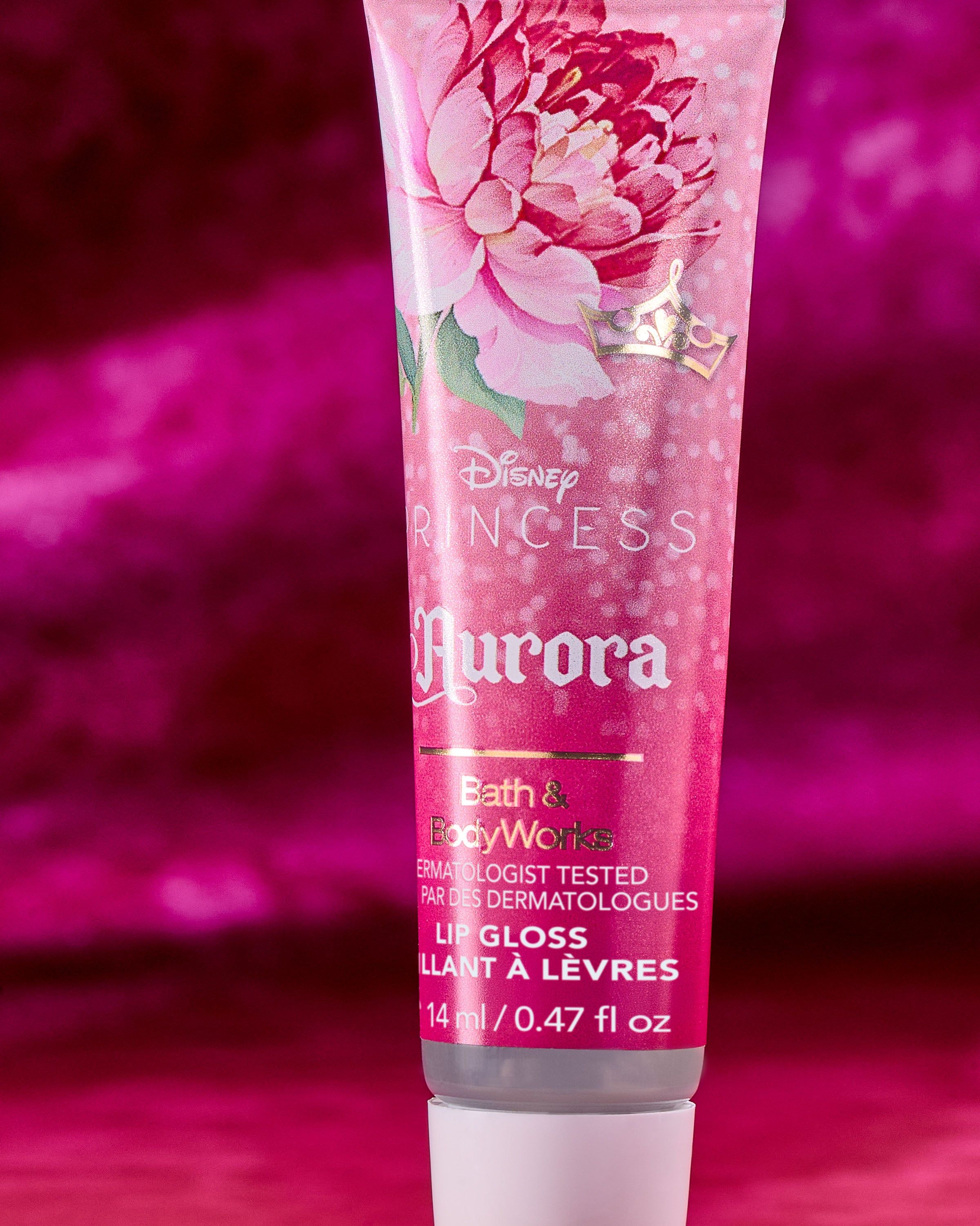 Lesk na rty Aurora Disney Princess – růžový lesk a elegantní květinový design.
