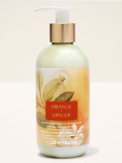 Tělové mléko Bath & Body Works Aromatherapy Orange + Ginger 248 ml ve světlé lahvi s pumpičkou.