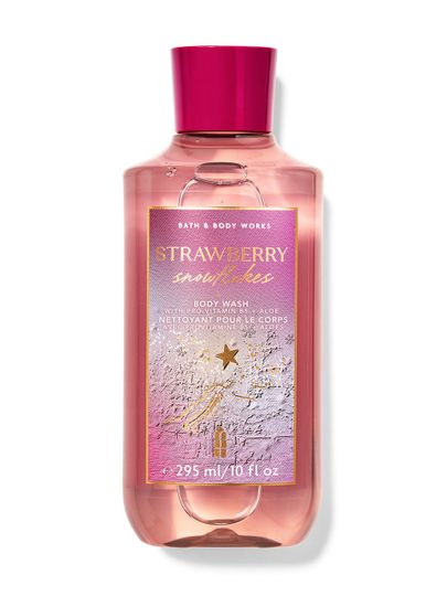 Różowy żel do mycia ciała "Strawberry Snowflakes" ze złotą gwiazdką na etykiecie. Bath & Body Works.