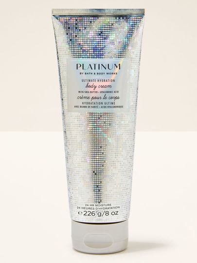 Srebrny krem do ciała z brokatowym motywem i napisem "Platinum", Bath & Body Works.