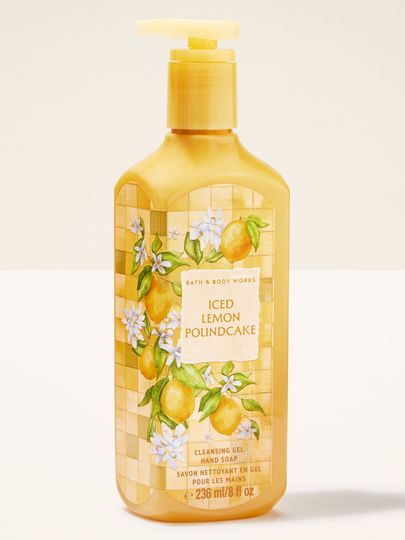 Gel na mytí rukou Bath & Body Works Iced Lemon Pound Cake 236 ml ve žluté lahvi s citrusovým motivem.