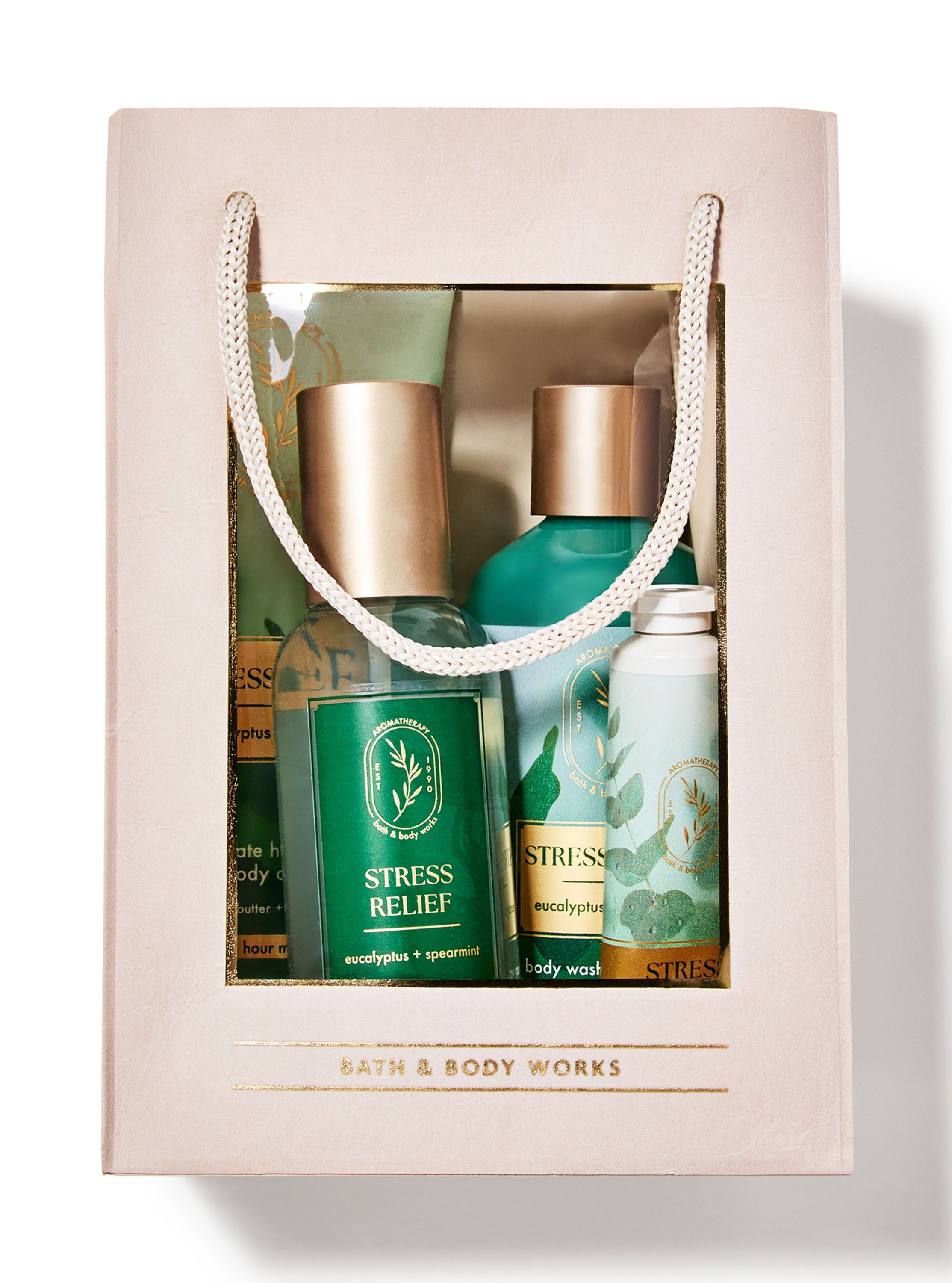 Dárkový balíček Bath & Body Works "Stress Relief" (Eucalyptus & Spearmint) ve světle růžové tašce.