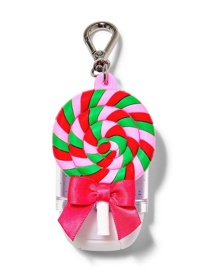 Świąteczne etui na żel do rąk w kształcie lizaka i różowej kokardy, Bath & Body Works.