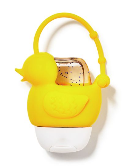Pouzdro na gel na ruce Bath&Body Works ve tvaru žluté kachny. Žluté, gumové pouzdro s karabinou.