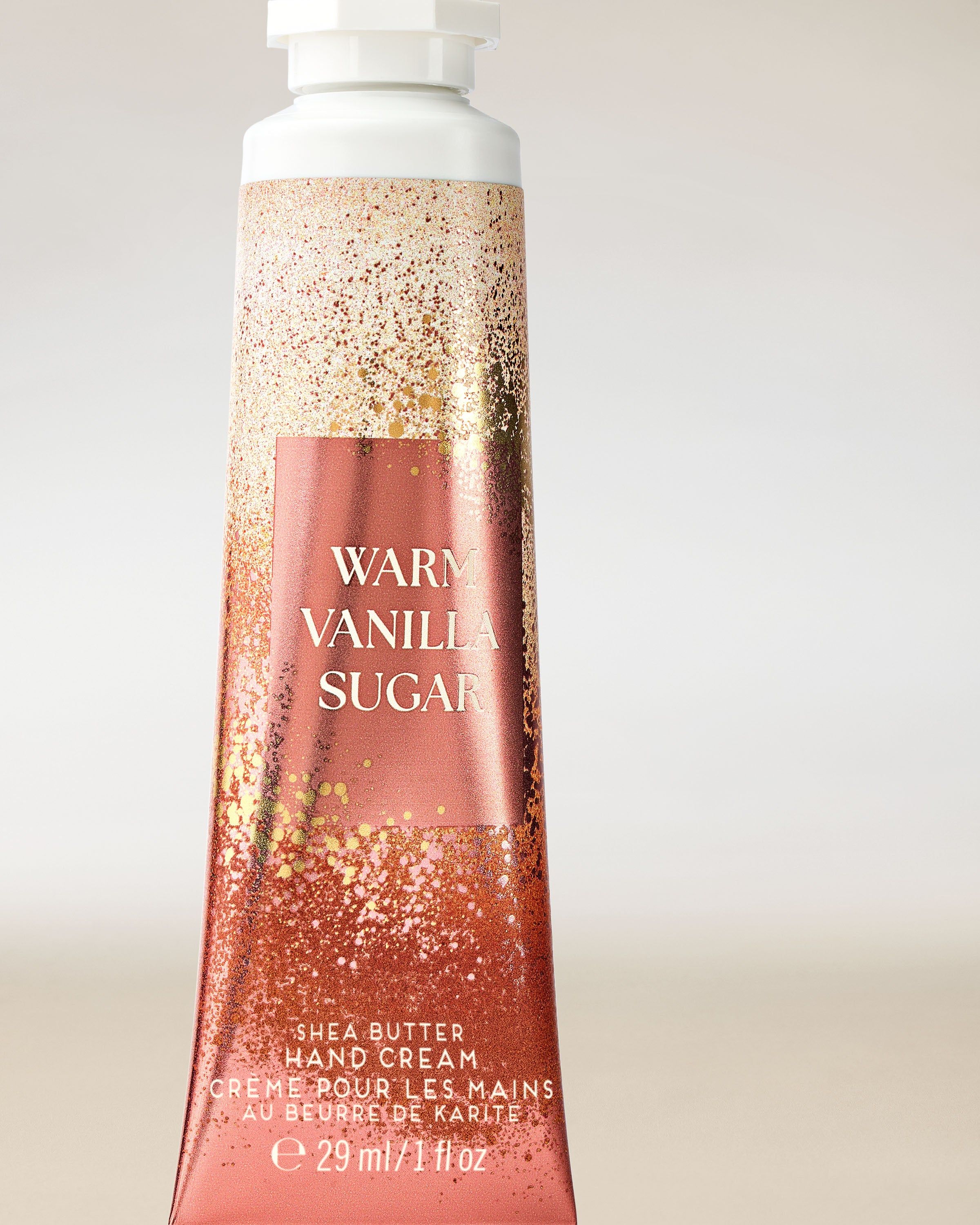 Krém na ruce Bath & Body Works Warm Vanilla Sugar ve zlaté vanilkové tubě, 29 ml.