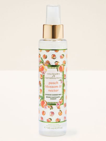 Bath & Body Works Peach Blossom & Nectar – třpytivá parfémová mlha Diamond Shimmer v průhledném flakonu se zlatým rozprašovačem.