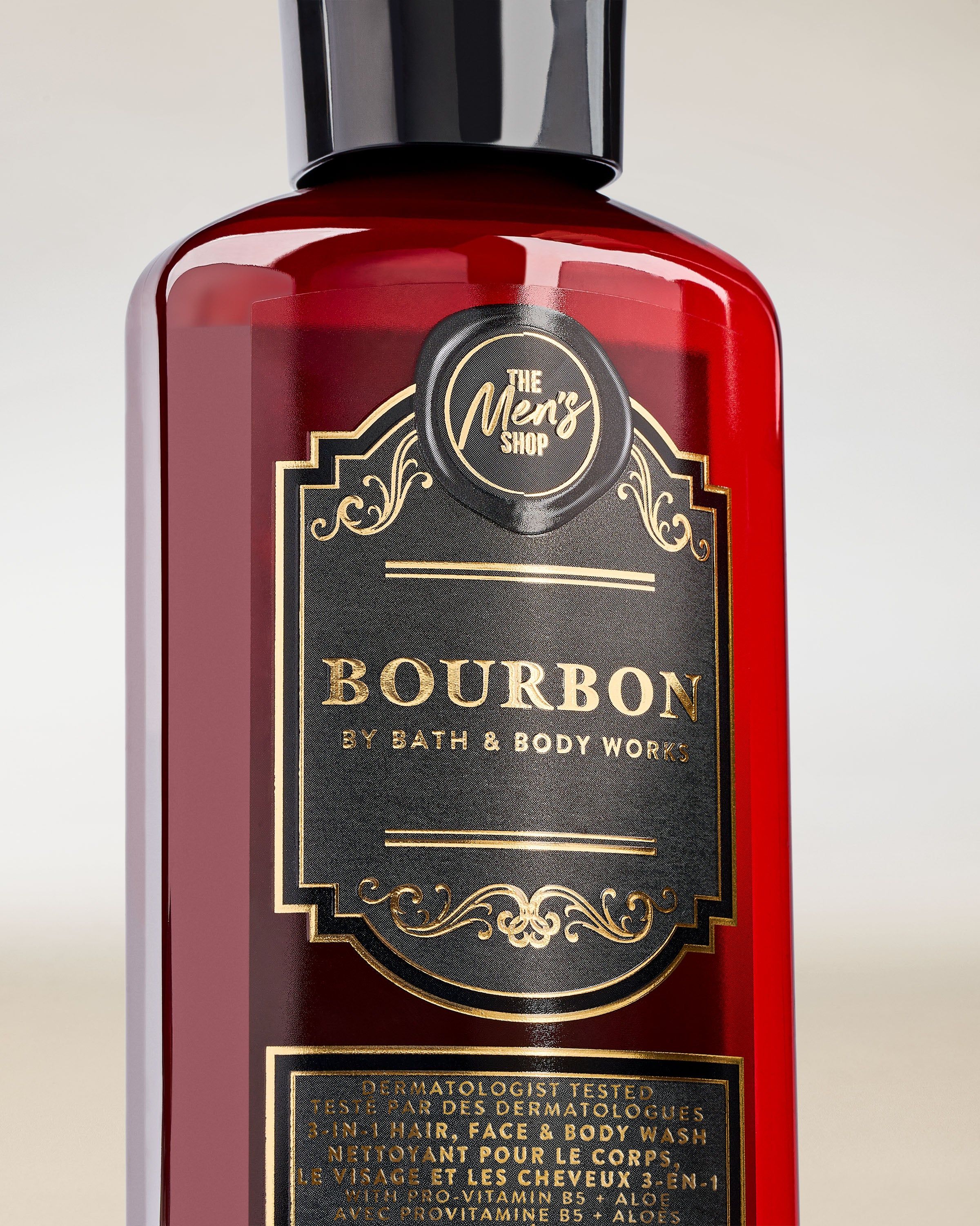 Bath & Body Works Bourbon – sprchový gel 3‑v‑1 na vlasy, obličej a tělo v tmavém flakonu s dekorativním štítkem.