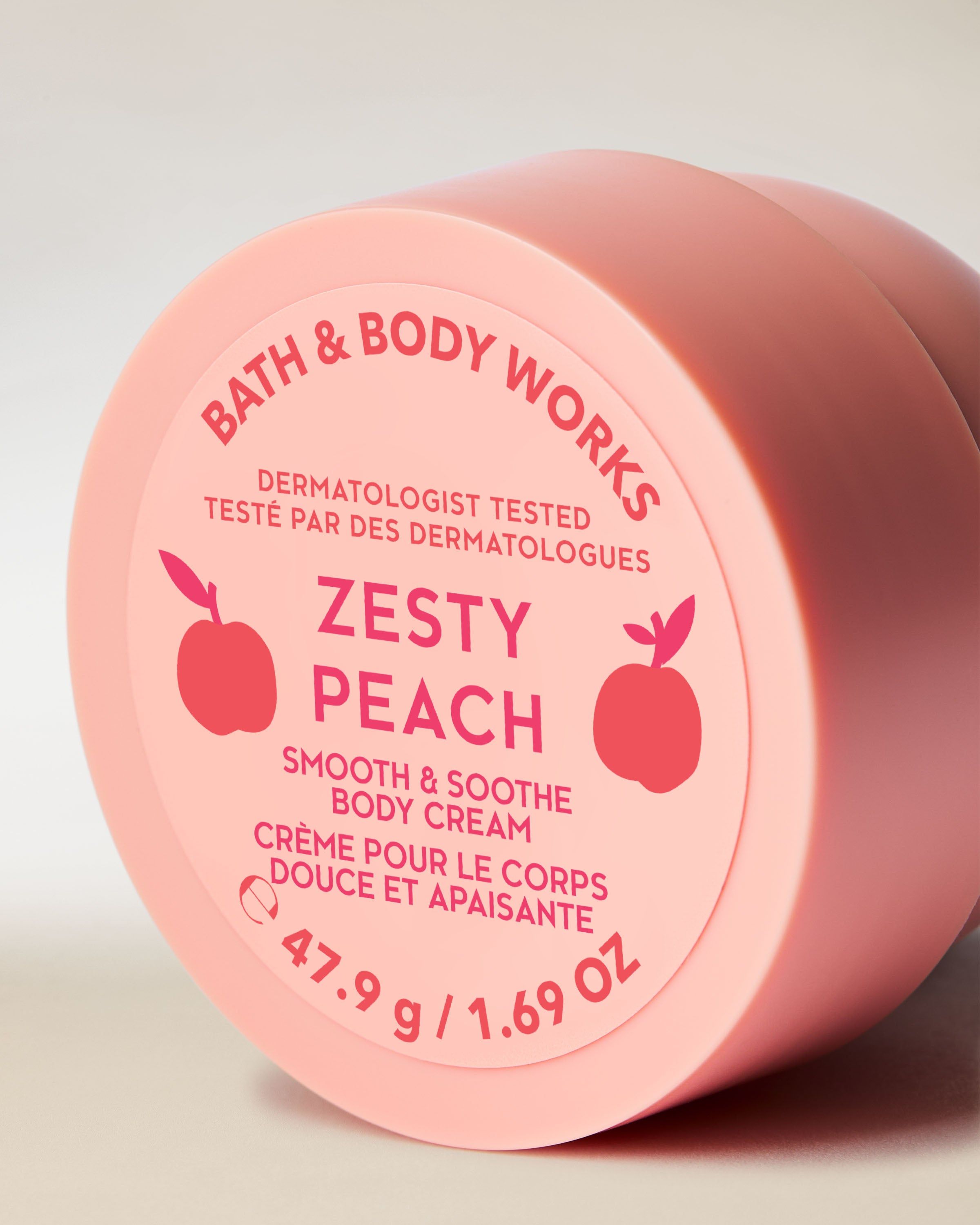 Tělový krém Zesty Peach v růžovém obalu