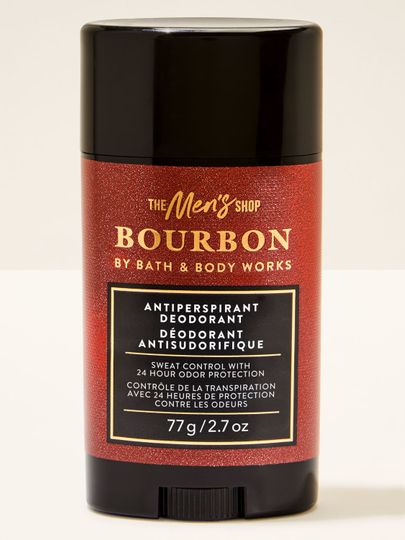 Deodorant v tyčince Bath&Body Works Bourbon. Černá tyčinka s lesklou červenou etiketou s nápisy.