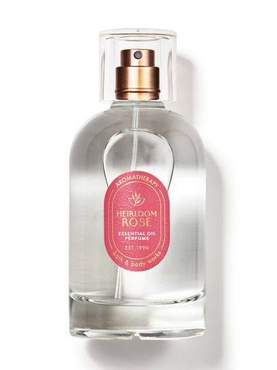 Parfémovaná voda Bath & Body Works Aromatherapy "Heirloom Rose" s esenciálním olejem, v průhledné lahvičce.