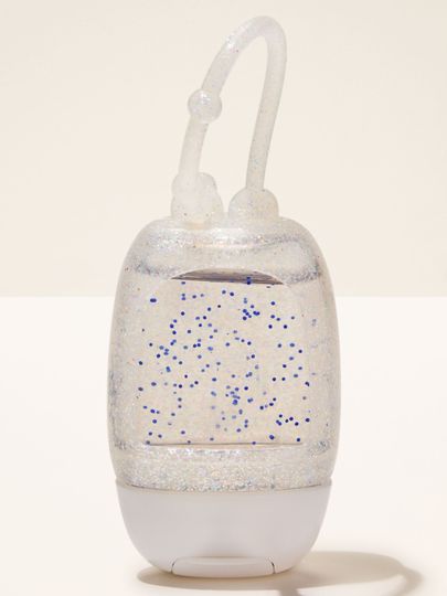 Třpytivý držák na PocketBac z pružného gelového materiálu, určený pro snadné uchycení mini dezinfekčního gelu.