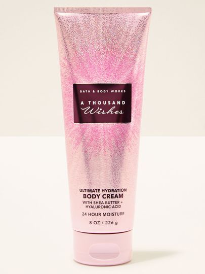 Tělový krém A Thousand Wishes Bath & Body Works v růžové tubě s třpytivým vzorem
