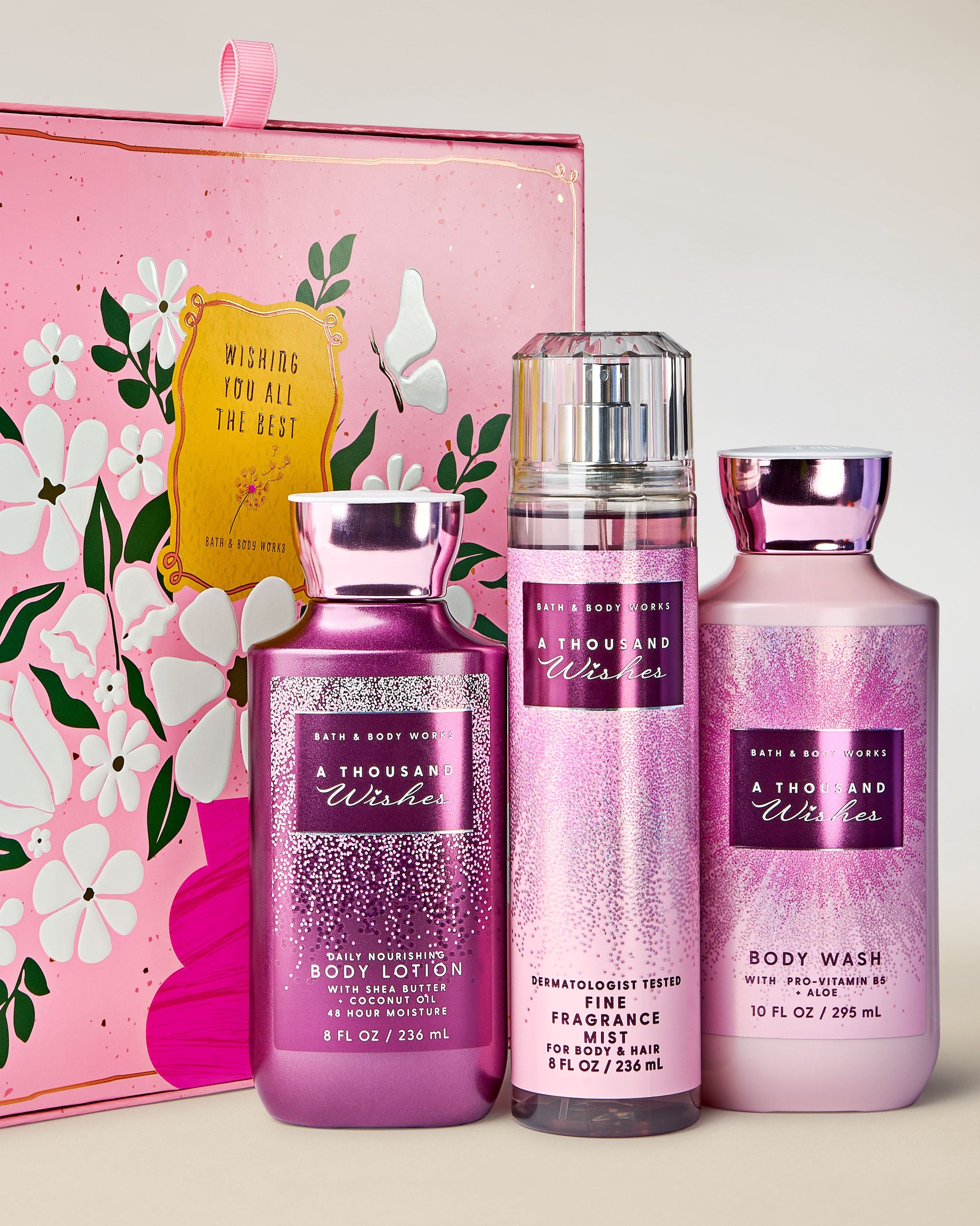 Dárková sada Bath & Body Works A Thousand Wishes s tělovou mlhou, sprchovým gelem a tělovým mlékem v ozdobné krabičce.