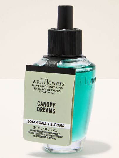 Náplň do difuzéru Wallflowers Canopy Dreams ve skleněné lahvičce, určená pro dlouhotrvající provonění interiéru.