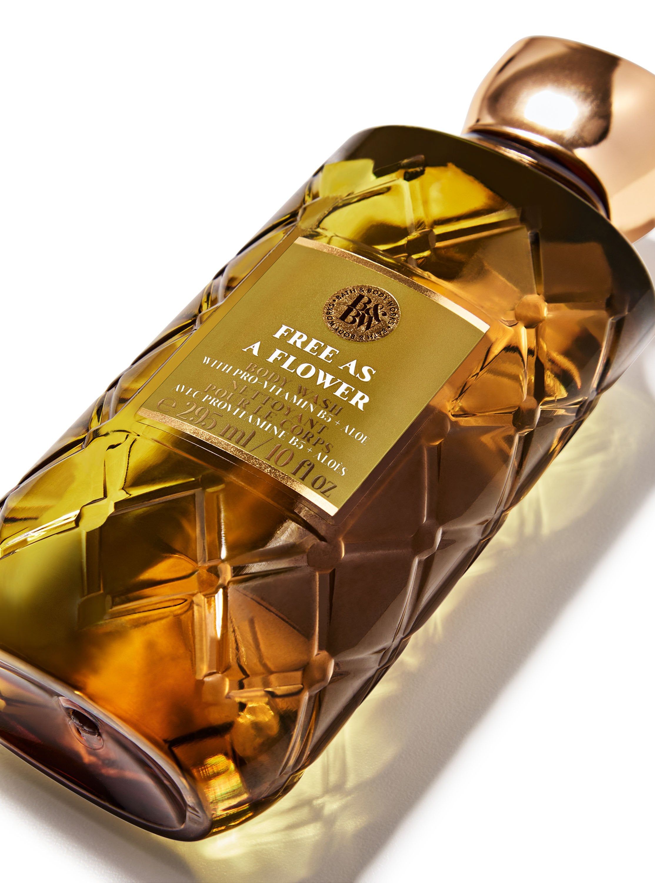 Detail hnědé lahvičky sprchového gelu Bath & Body Works Free as a Flower (295 ml).