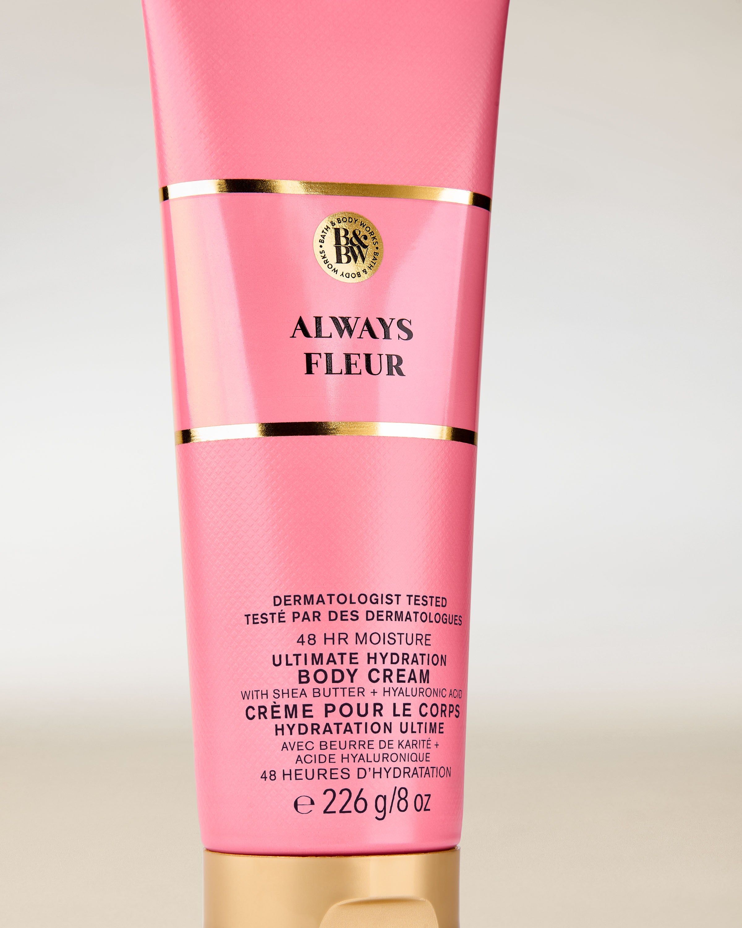 Tělový krém Always Fleur Bath & Body Works v růžové tubě se zlatými detaily – intenzivní hydratace.