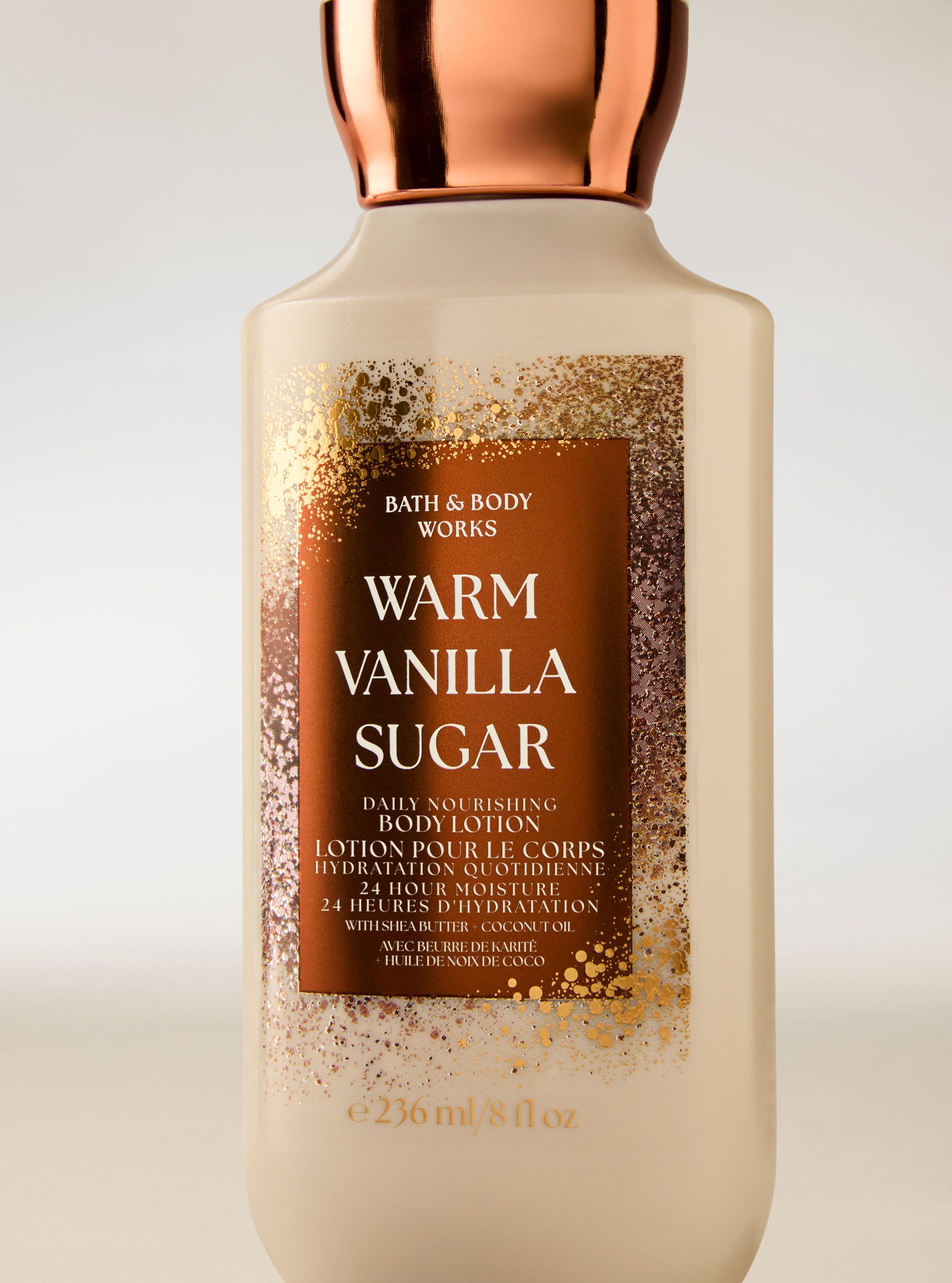 Tělové mléko Bath & Body Works Warm Vanilla Sugar ve světlé lahvi s měděným