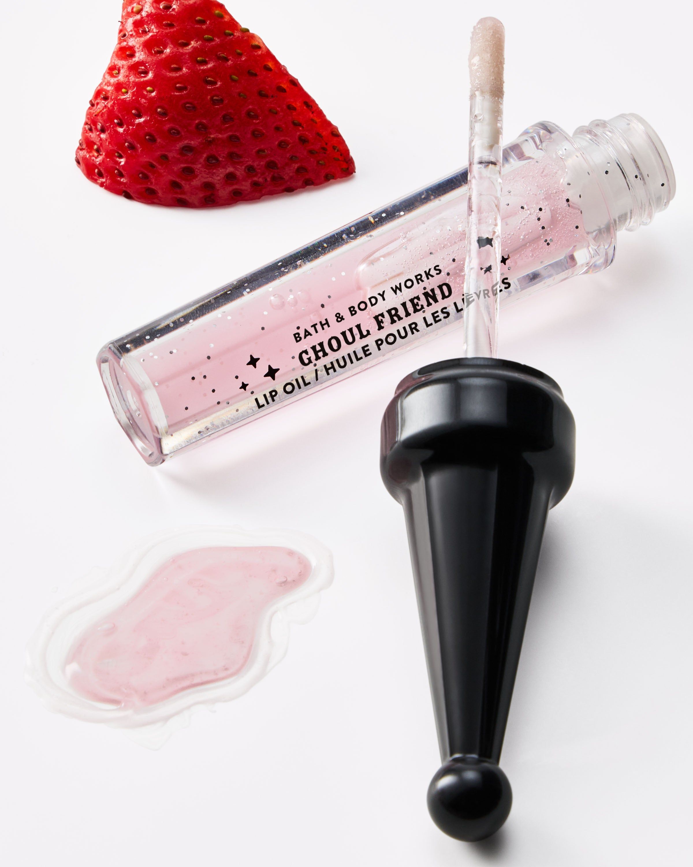 Lesk na rty Bath & Body Works Ghoul Friend s třpytivými částicemi