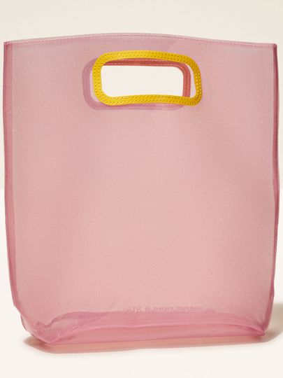 Růžová taška Bath & Body Works s třpytkami, ideální na dárky z letní kolekce.