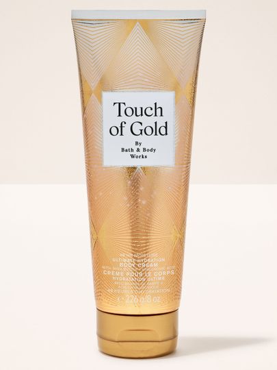 Tělový krém Touch of Gold od Bath & Body Works ve zlaté tubě s intenzivně hydratační a luxusní formulí.