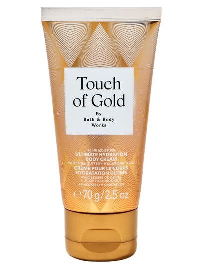Mini tělový krém Touch of Gold od Bath & Body Works ve zlaté tubě s intenzivně hydratační formulí.