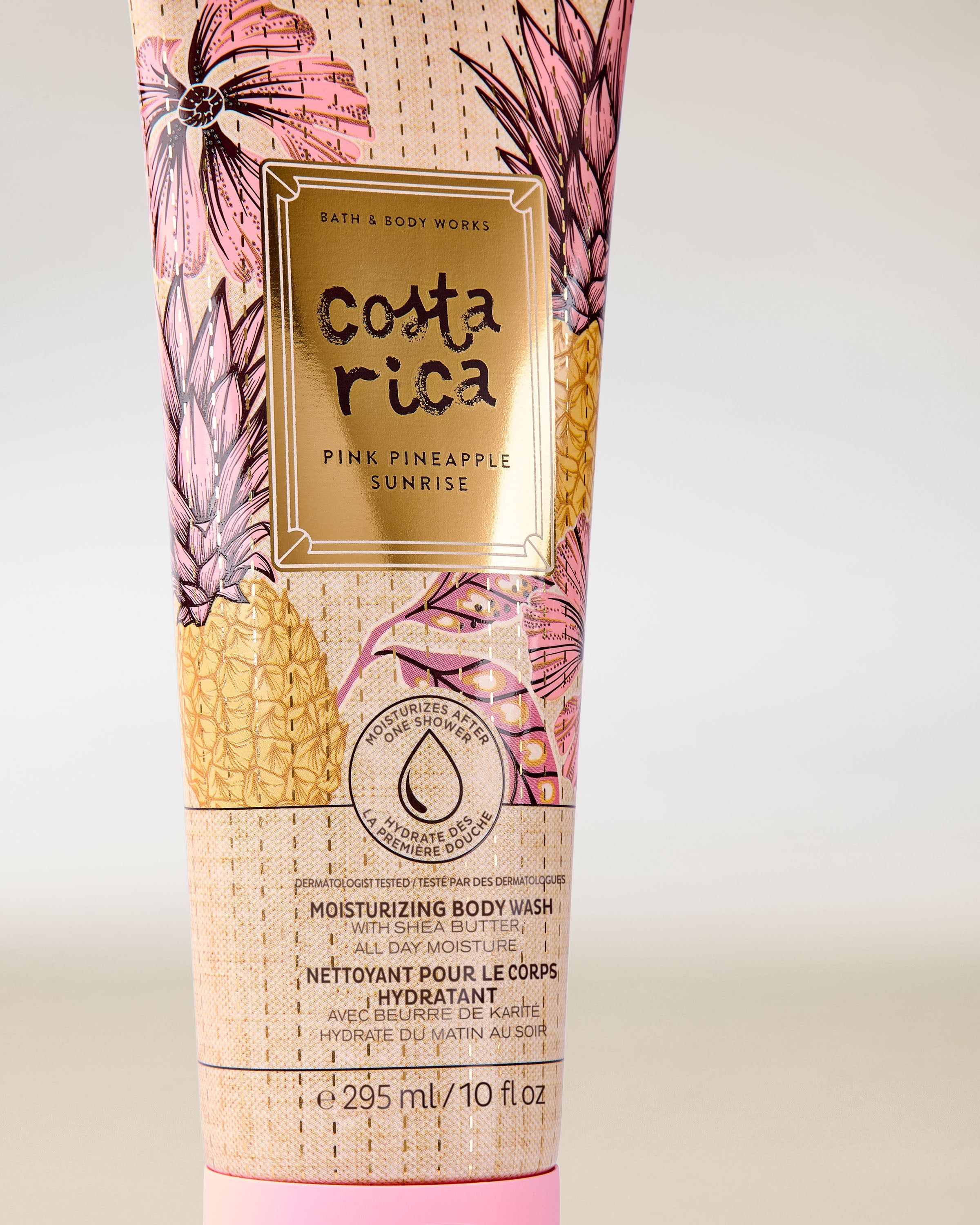 Hydratační sprchový gel Costa Rica Pink Pineapple Sunrise v tubě s tropickým motivem a růžovými detaily.