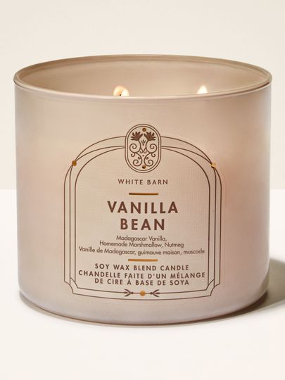 Hořící svíčka Vanilla Bean White Barn v béžové skleněné nádobě s elegantní etiketou