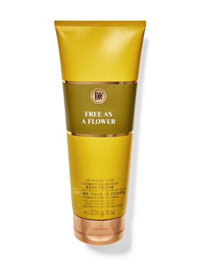 Tuba tělového krému Bath & Body Works Free as a Flower (226 g) v odstínech hořčicově žluté a olivově zelené.