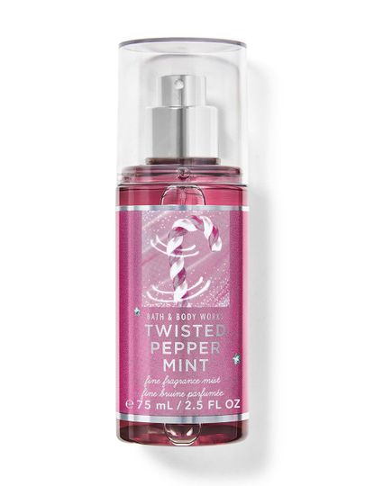 Mgiełka zapachowa Twisted Peppermint, w wersji podróżnej, w różowej butelce z motywem laski cukrowej. Bath&Body Works.