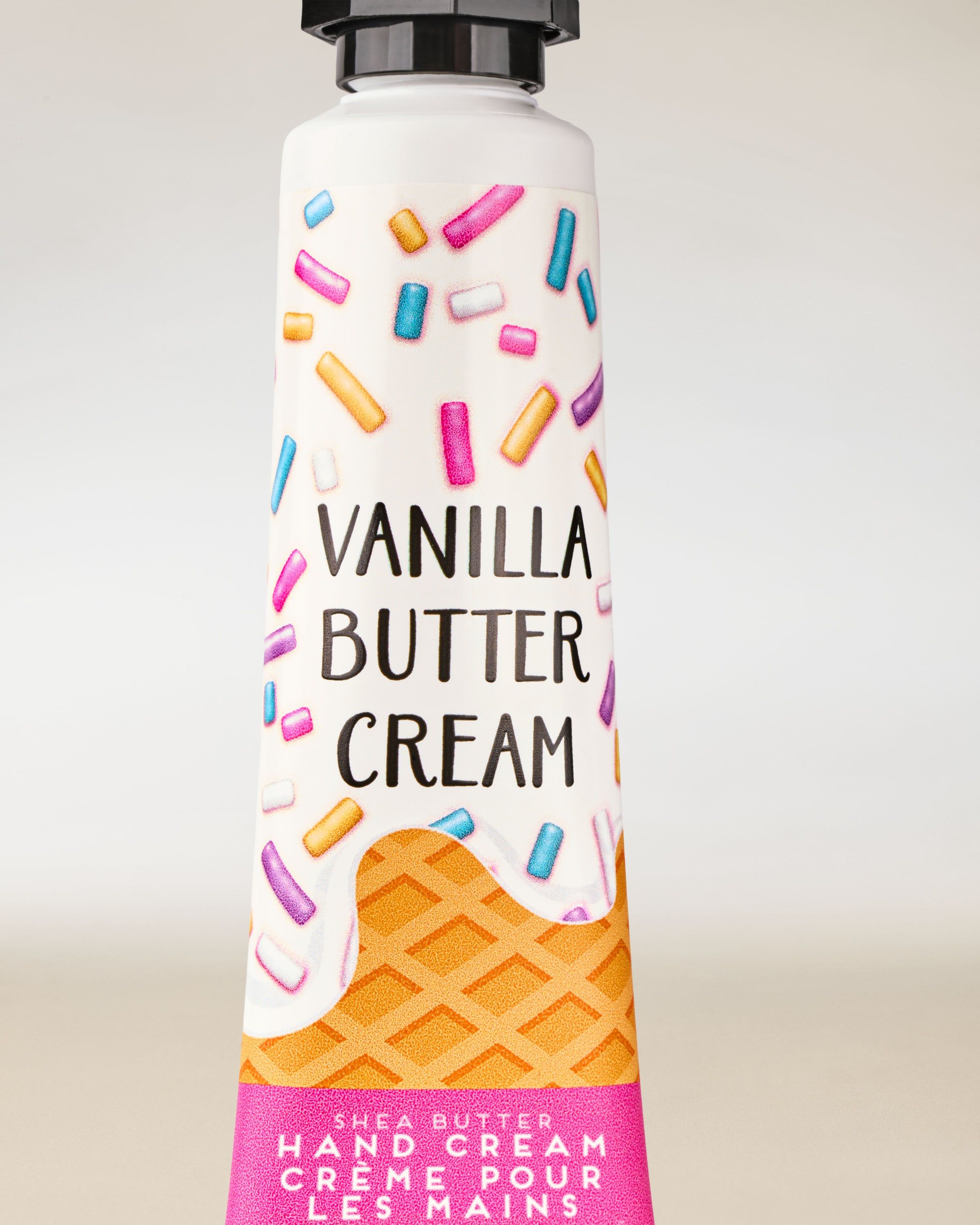 Krém na ruce Bath & Body Works Vanilla Butter Cream v barevné tubě, 29 ml.