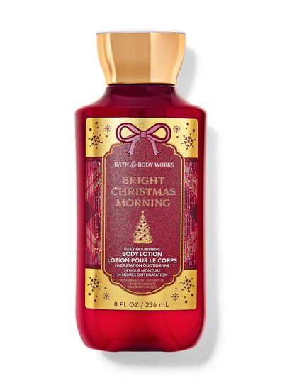Czerwony balsam do ciała z motywem złotego, świątecznego opakowania i nazwą "Bright Christmas Morning", Bath & Body Works.