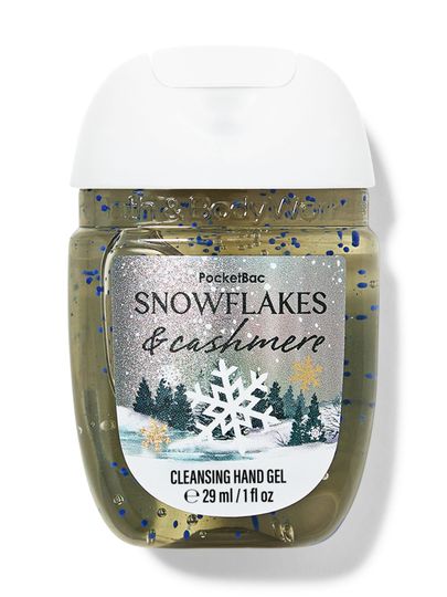 Oczyszczający żelik do rąk „Snowflakes & Cashmere” w złotawym opakowaniu z zimowym krajobrazem i płatkami śniegu. Bath & Body Works.