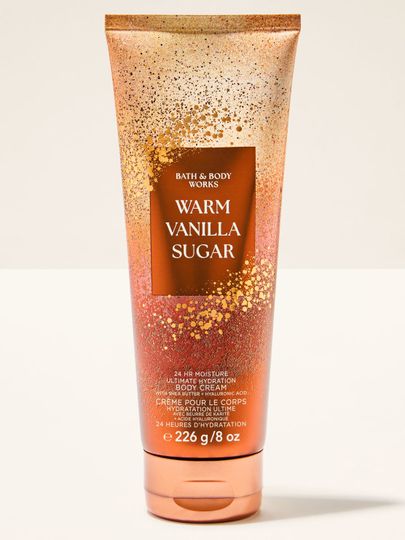 Warm Vanilla Sugar – tělový krém Bath & Body Works v hnědo-zlaté tubě z kolekce Warm Vanilla Sugar