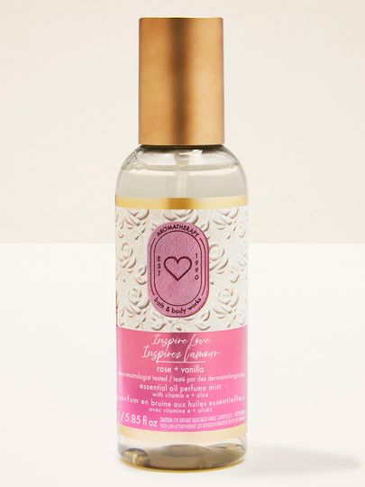 Inspire Love rose + vanilla – voňavá mlha s růžovo‑vanilkovým tónem v lahvi se zlatým víčkem.