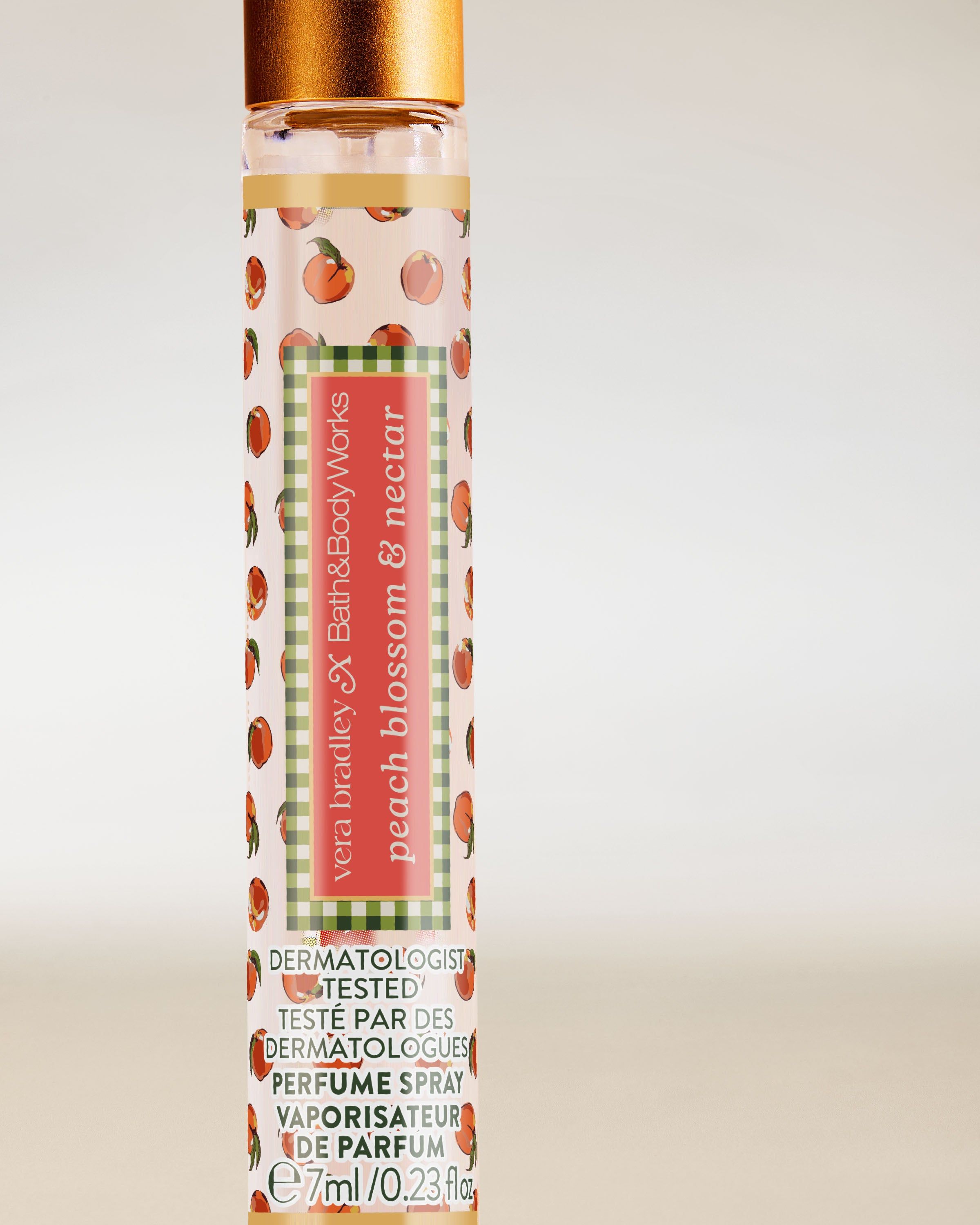 Bath & Body Works Peach Blossom & Nectar – mini parfém ve spreji v úzkém flakonu s broskvovým motivem.