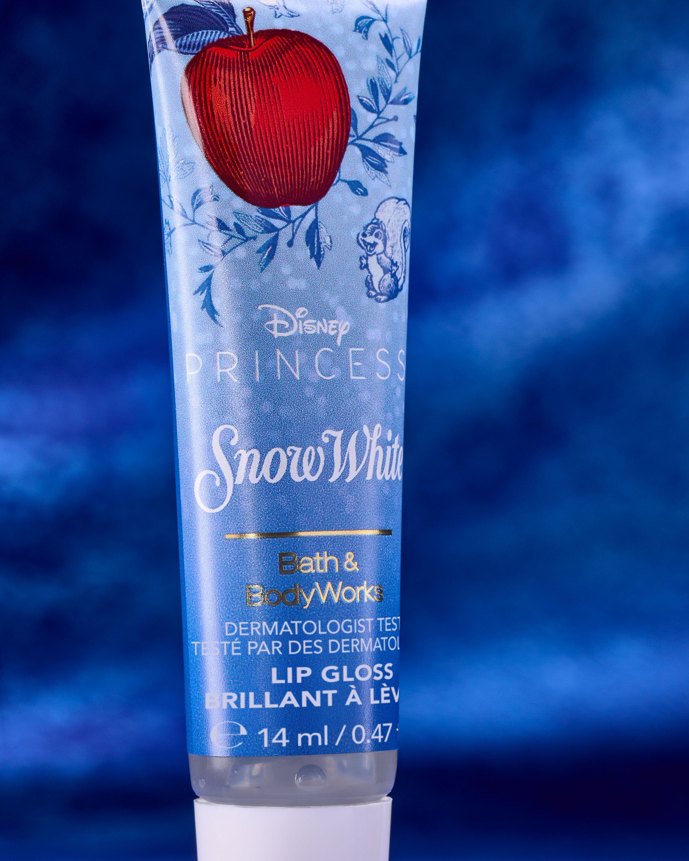 Lesk na rty Snow White Disney Princess – modré balení s jablkem a pohádkovým leskem.