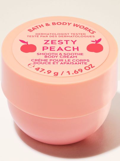 Tělový krém Zesty Peach v růžovém obalu