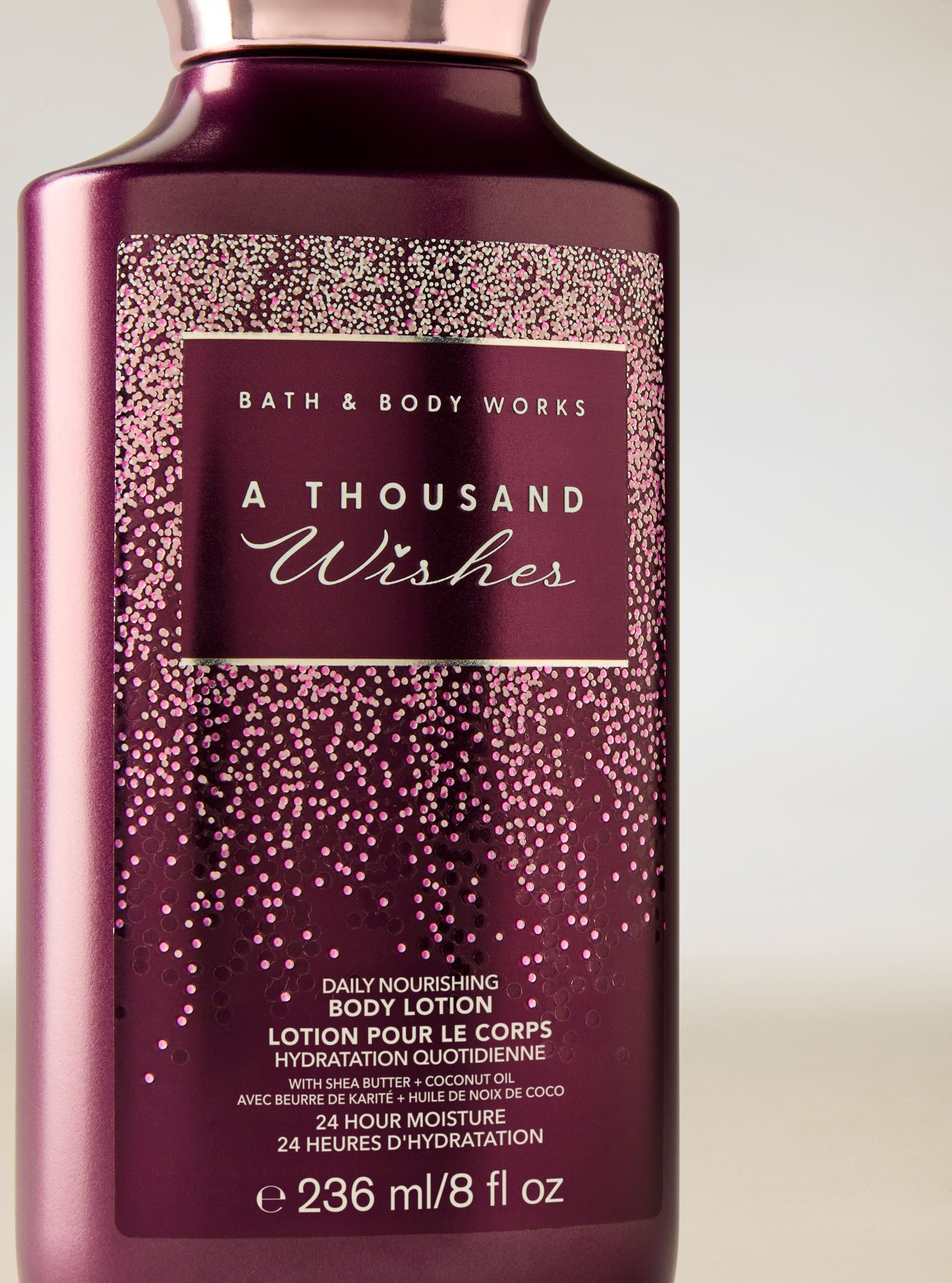Tělové mléko Bath & Body Works A Thousand Wishes ve fialové lahvi s třpytivým štítkem