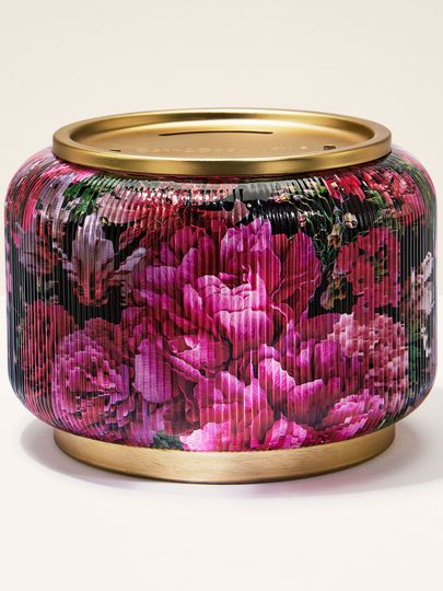 Dekorativní kryt na svíčku – výrazné růže a zlaté detaily v elegantním designu.