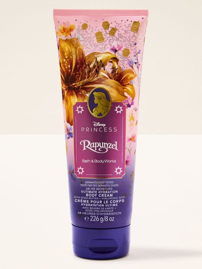 Tělový krém Rapunzel Disney Princess – růžovo‑fialový design se zlatými detaily a 48h hydratací.