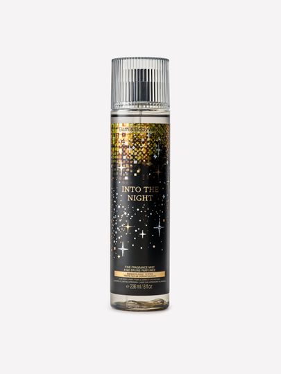 Tělová parfémová mlha Into the Night Bath & Body Works v černém flakonu se zlatým motivem hvězd