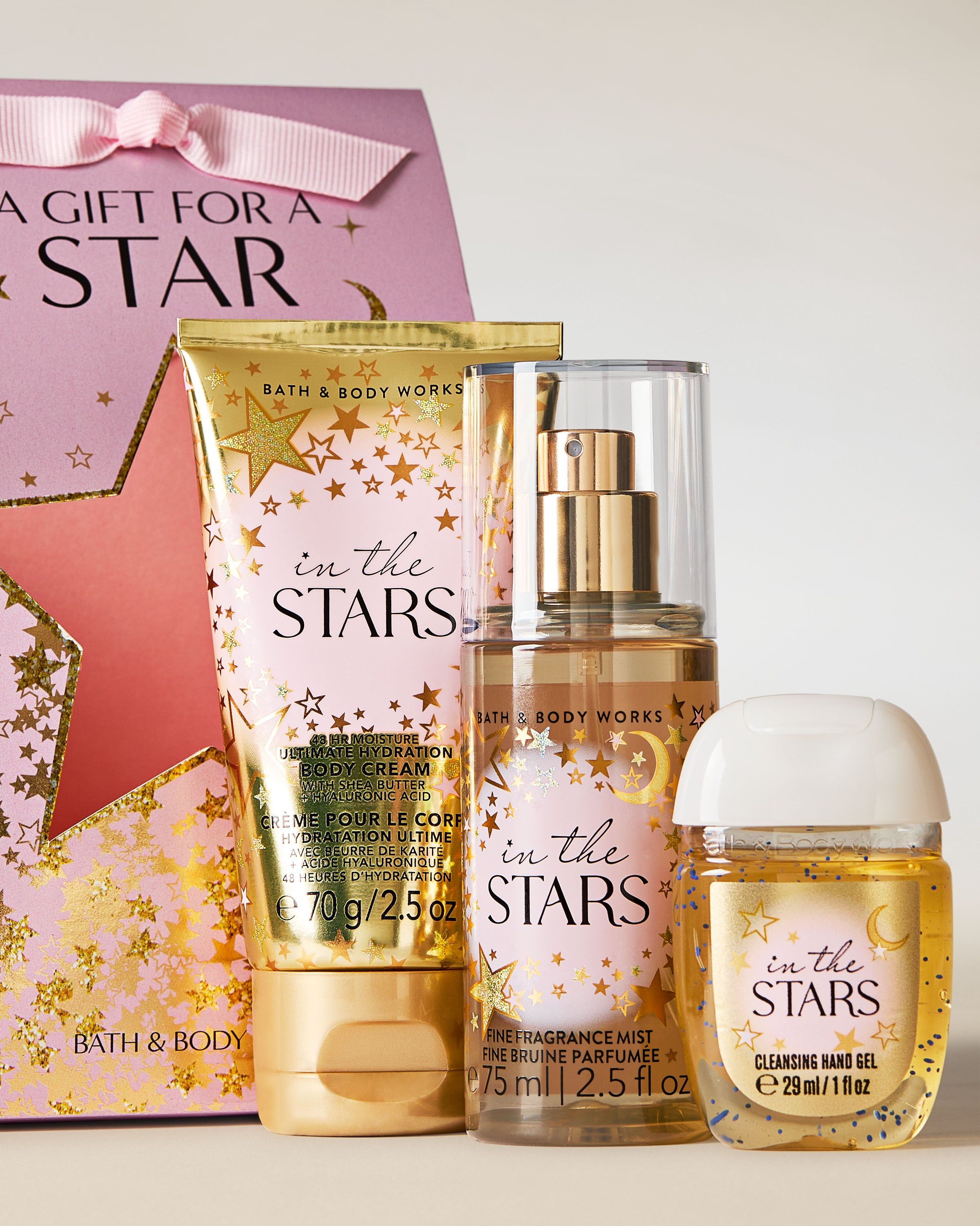Set In the Stars od Bath & Body Works – krém, sprej a gel ve zlatě‑růžovém hvězdném stylu.