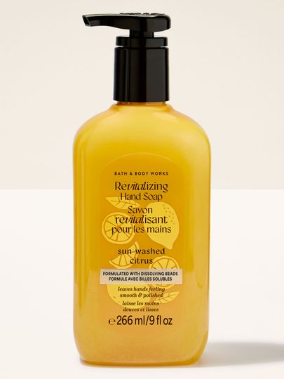 Gel na mytí rukou Bath & Body Works Sun‑Washed Citrus 266 ml ve žluté lahvi s pumpičkou.