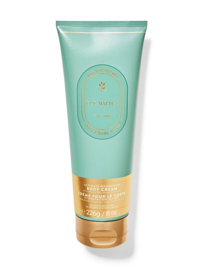 Tělový krém Bath & Body Works Aromatherapy "Eucalyptus" v tyrkysové tubě se zlatým písmem a uzávěrem.