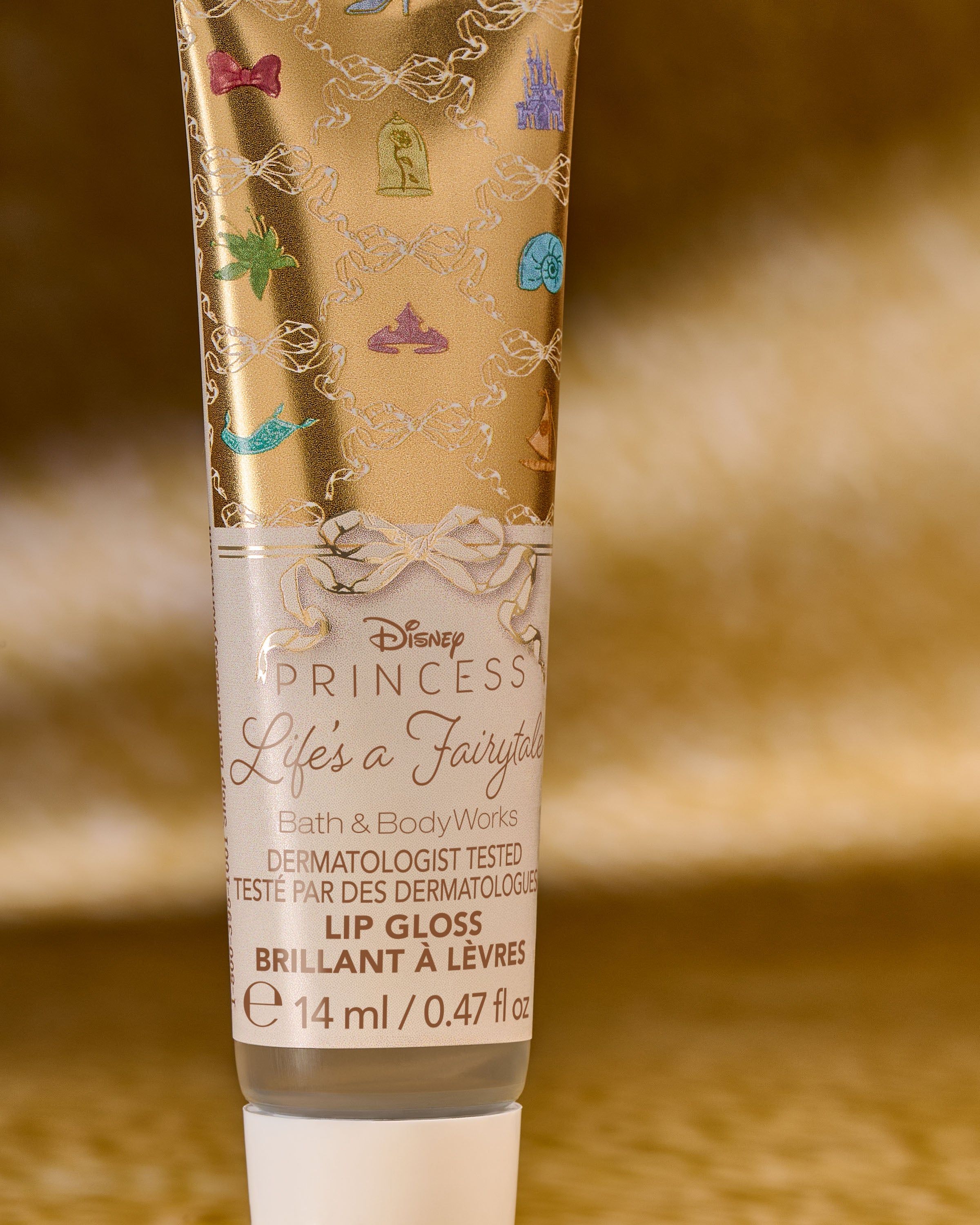 Lesk na rty Life’s a Fairytale Disney Princess – zlaté balení a pohádkový lesk od Bath & Body Works.