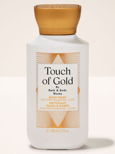 Touch of Gold – sprchový gel Bath & Body Works v bílé lahvi se zlatým víčkem z kolekce Touch of Gold