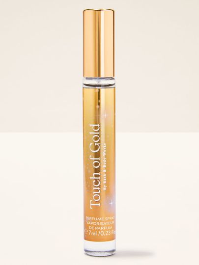 Touch of Gold – parfémový sprej Bath & Body Works ve štíhlé zlaté lahvi z kolekce Touch of Gold